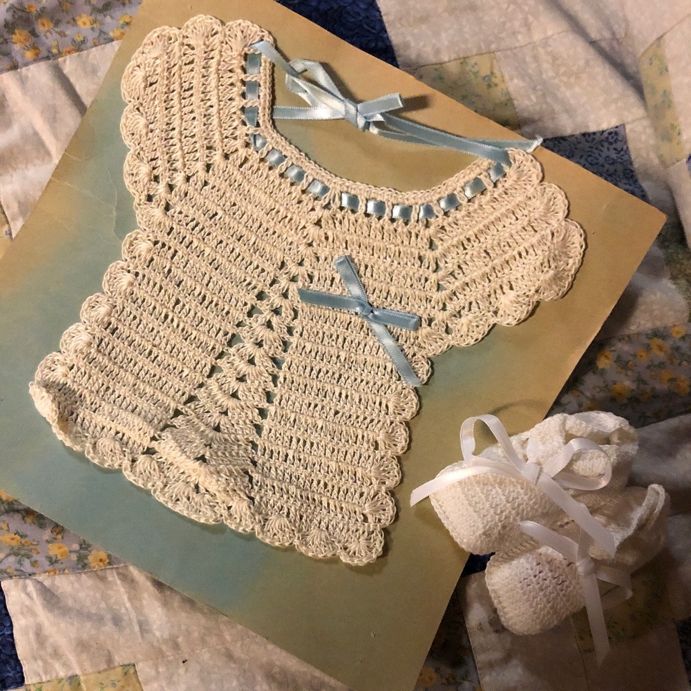 Hand knitted newborn outfit